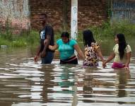 Imagen de archivo de un sector inundado en Milagro, provincia del Guayas.