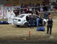Conmoción en Anconcito por el asesinato de dos hombres dentro de un auto que usaban como taxi