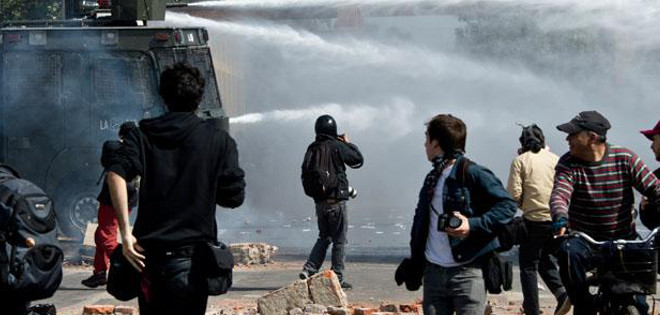 Disturbios con heridos y daños en aniversario de golpe de Pinochet en Chile