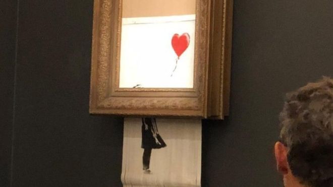 Una obra de Banksy se autodestruye tras ser vendida