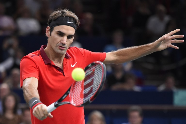 Federer y Ferrer avanzan a cuartos en París-Bercy, Wawrinka eliminado