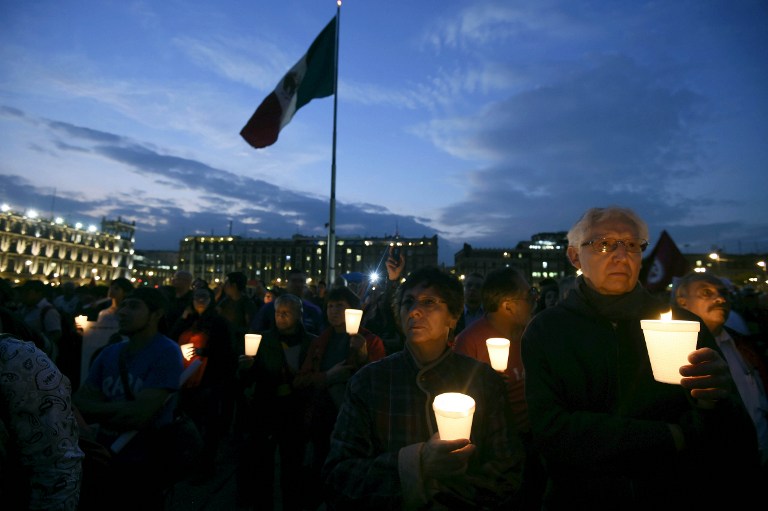 Miles marchan en México a cuatro meses de desaparición de 43 estudiantes
