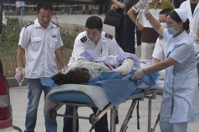 Suben a 71 los muertos por explosión en fábrica china
