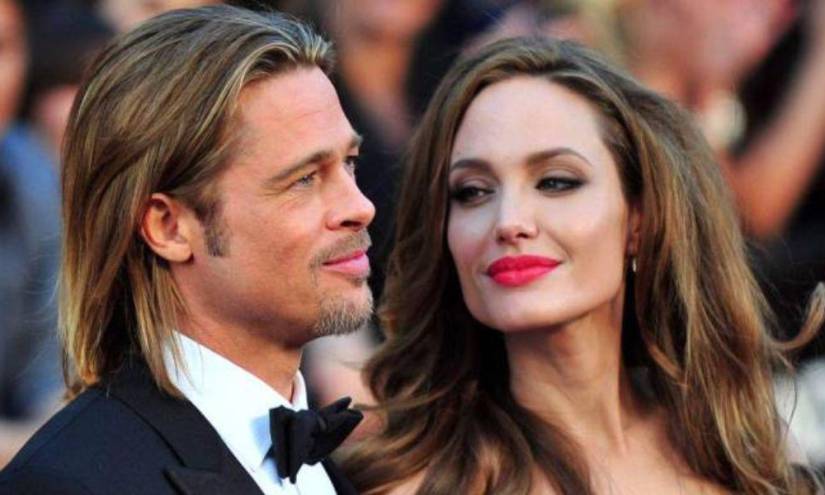 Brad Pitt junto a Angelina Jolie, la pareja que culminó con su relación amorosa en 2019, en una imagen de archivo.