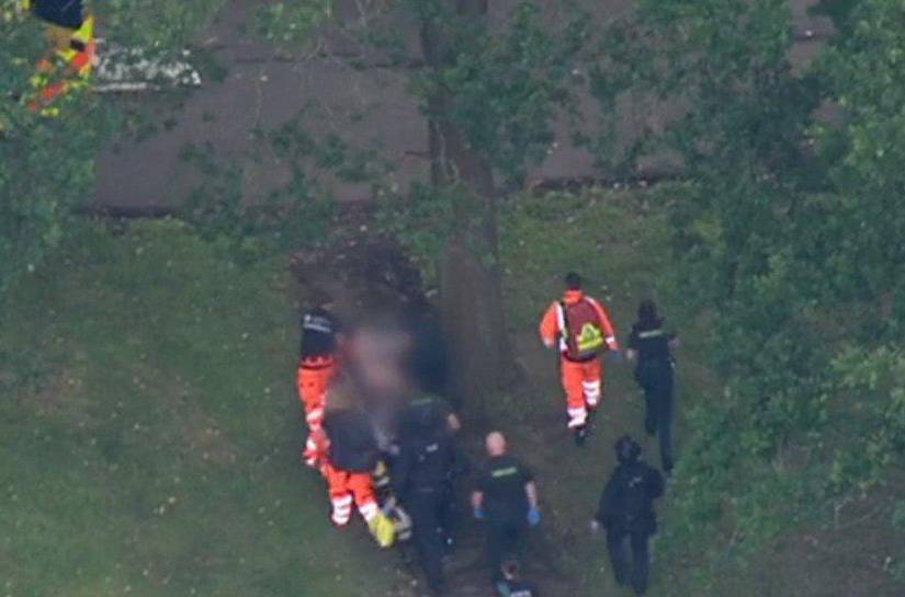 Autoridades llevando al principal sospechoso del triple femicidio