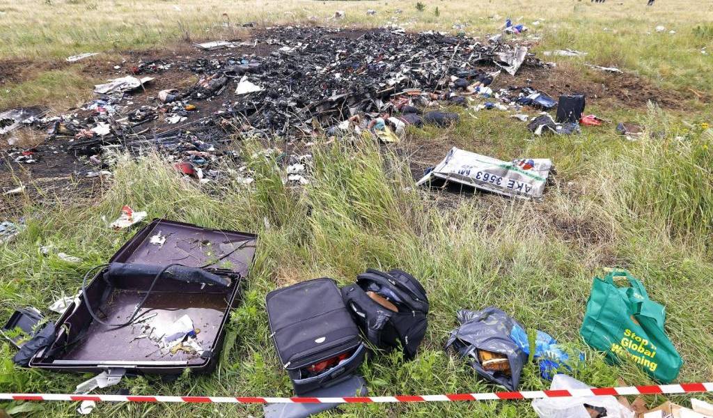 2 pasajeros del Boeing malasio derribado en Ucrania siguen sin identificar