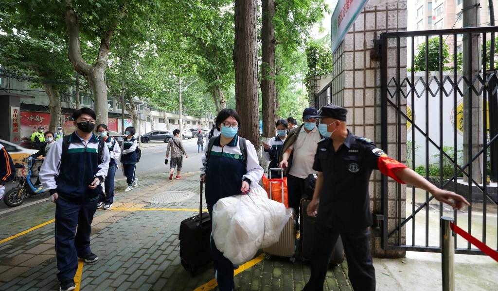 China pide derrotar al coronavirus antes de investigar su origen