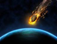 Imagen conceptual de un meteorito cayendo sobre la Tierra.