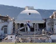 Imagen de referencia en la que se ve el Palacio Nacional de Haití destruido por el terremoto de 2010.