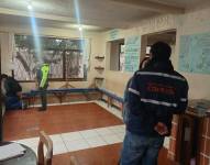 Funcionarios de AMC y Policía Nacional durante una intervención.