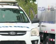 Imagen de policías en Daule tras el reporte de un fallecido.