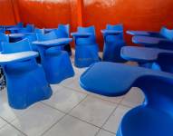 Imagen de pupitres vacíos, en referencia