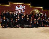 MADRID, 22/12/2025.- Los niños de San Ildefonso posan tras la celebración del Sorteo Extraordinario de Navidad este lunes en el Teatro Real de Madrid. EFE/Chema Moya