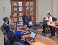 Reunión de representantes de la CFN con miembros del Banco Mundial.