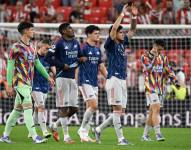 Jugadores del Arsenal celebran la victoria ante el Athletic Club de Bilbao por la Champions League.