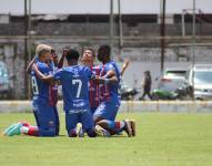 Jugadores del Deportivo Quito celebran un gol