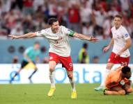Robert Lewandowski, celebrando su primer gol mundialista.