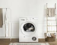 Imagen referencial de lavadora en cuarto de lavado.