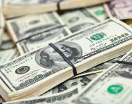 Background of many US dollars banknotes