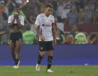 Ezequiel Piovi (d) de LDU reacciona al perder la final de la Recopa Sudamericana ante Fluminense.