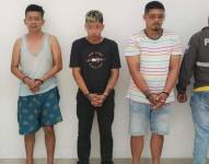 Imagen de personas detenidas por el asalto y asesinato de una mujer en el centro de Guayaquil.
