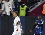 Dayro Moreno (i), de Once Caldas, celebra un gol en un partido por los cuartos de final de la Copa Sudamericana.
