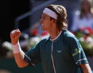El tenista ruso Andrey Rublev reacciona ante el tenista estadounidense Taylor Fritz durante el partido de semifinales del Mutua Madrid Open