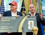 El presidente de los Estados Unidos, Donald Trump, y el presidente de la FIFA, Gianni Infantino, el día en el que anunciaron la fecha del sorteo del Mundial 2026, el pasado 22 de agosto.