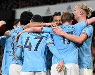 Los jugadores del Manchester City festejan el tercer tanto sobre Arsenal, que llegó por intermedio del delantero noruego Erling Haaland (d).