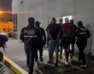 Imagen de los cuatro detenidos por el ataque contra una terminal portuaria en el sur de Guayaquil.