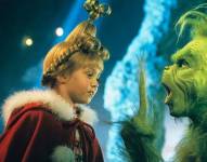 Jim Carrey y Taylor Momsen en El Grinch.