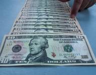 En poder de los detenidos se encontró 18 mil dólares, y al menos 50 mil dólares falsos. Referencial