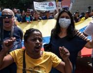 Miles de trabajadores tomaron las calles de Venezuela este 23 de enero exigiendo una nivelación de salarios acorde con el aumento de la inflación y el alto costo de la canasta familiar básica.