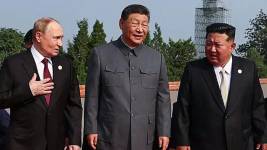 De izquierda a derecha, Putin, Xi y Kim.