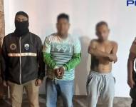 Imagen de dos sospechosos detenidos por la Policía Nacional.
