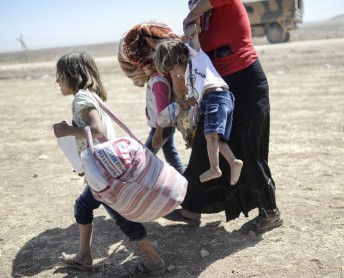 Una avalancha de sirios huyen a Turquía