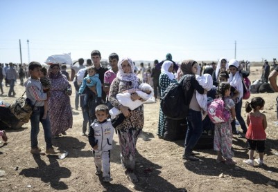 Una avalancha de sirios huyen a Turquía