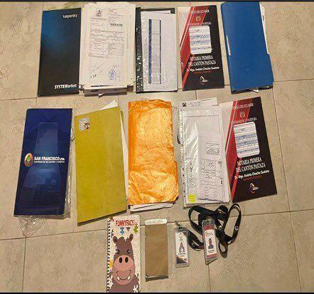 Documentos incautados de presunta red de captación ilegal de dinero.