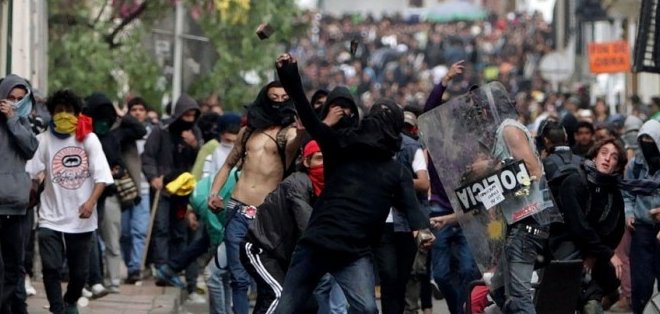 Cinco muertos y cuantiosos daños dejan los disturbios en Colombia