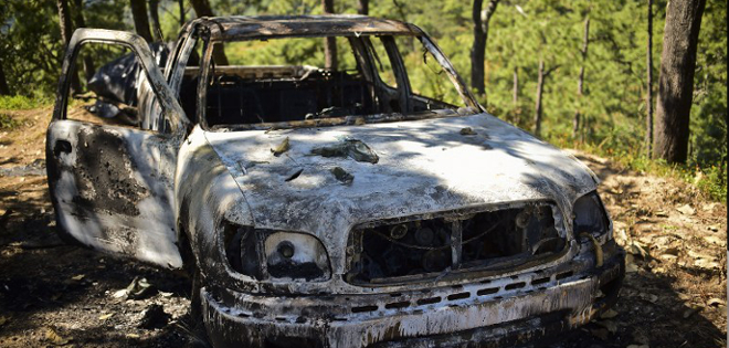 Caza de &quot;El Chapo&quot; deja casas baleadas y carros calcinados