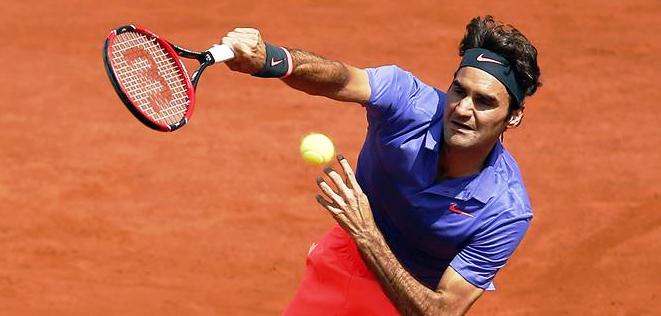 Roger Federer pasa por la vía rápida a tercera ronda