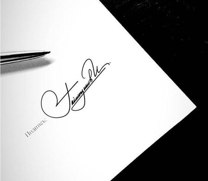 Imagen referencial de firma subrayada a blanco y negro.