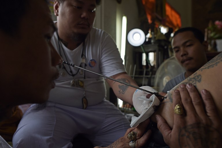 Trance y tatuajes en un festival en Tailandia