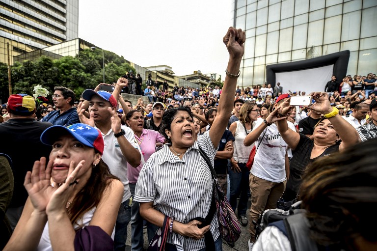 Oposición venezolana reta al gobierno con marcha al centro de Caracas
