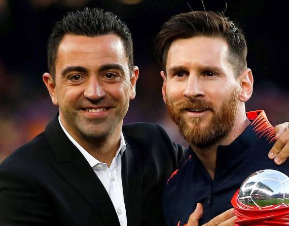 Xavi y Messi.