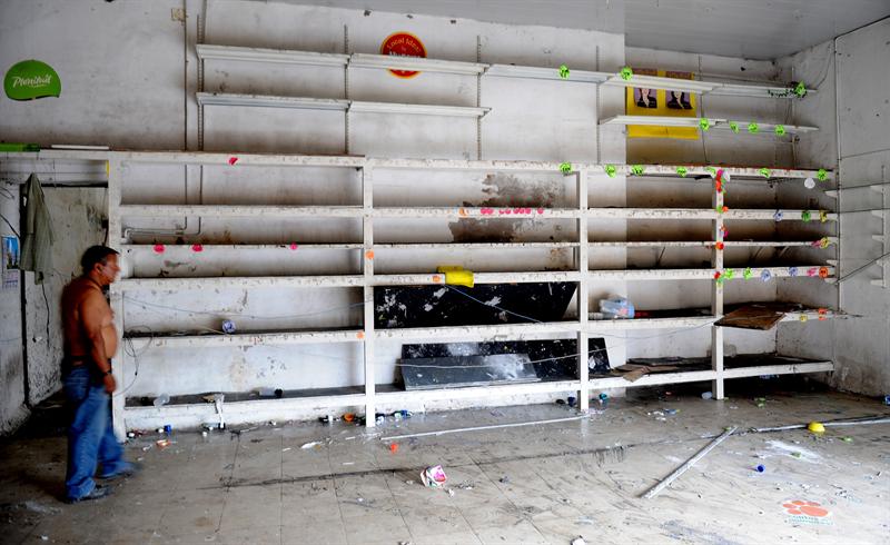 Ascienden a 9 los muertos durante oleada de saqueos en Argentina