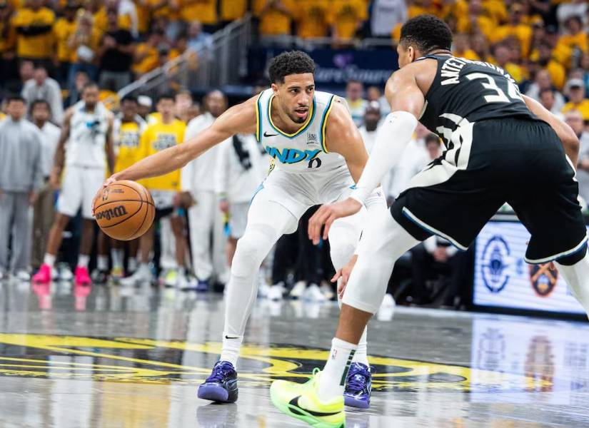 Tyrese Haliburton y Giannis Antetokounmpo