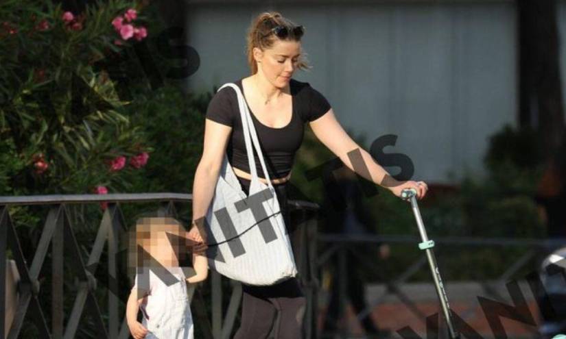 Amber Heard junto a su hija en la ciudad de Madrid